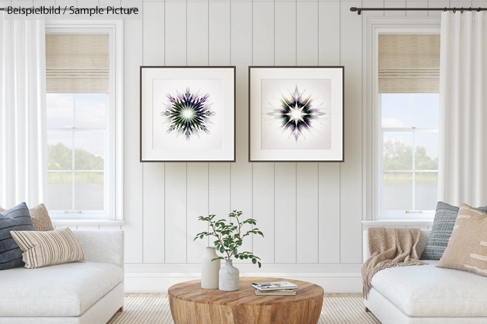 Minimalist living room with abstract artwork, two windows, light-colored walls, and cozy furnishings.