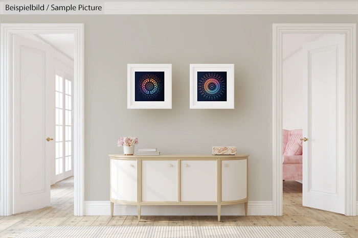 Elegant hallway with modern circular art on gray walls, white console table, and light wood flooring.