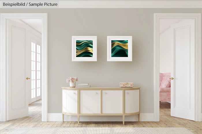 Elegant hallway with two abstract green and gold artworks above a white console table, flanked by open doorways.