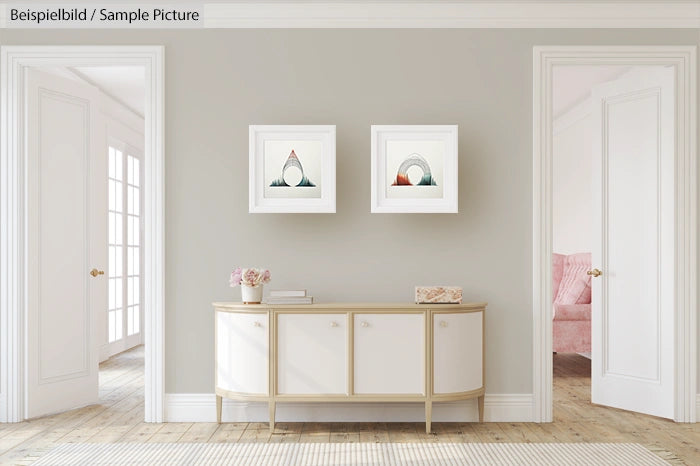 Elegant room with white console, framed art, and pink armchair visible through open doorway.