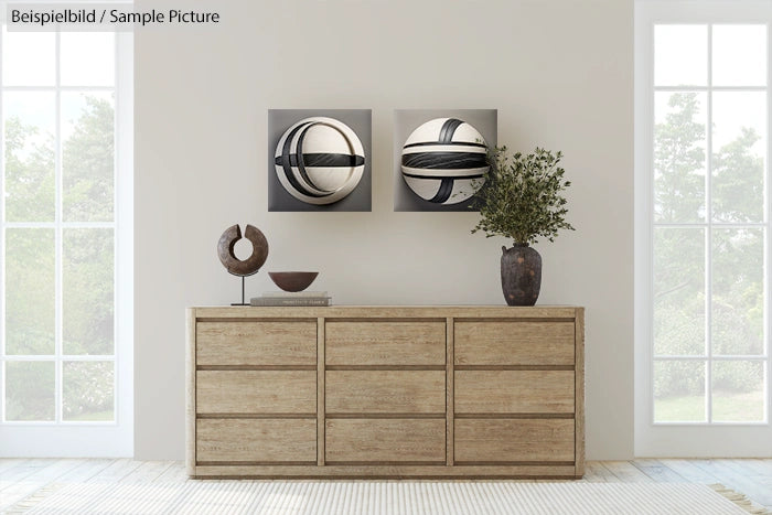 Modern living room with wooden sideboard, abstract geometric wall art, and decorative vases.