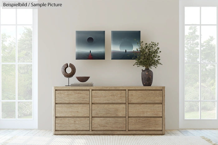 Minimalist room with wooden dresser, abstract art, and decorative plants near large windows.