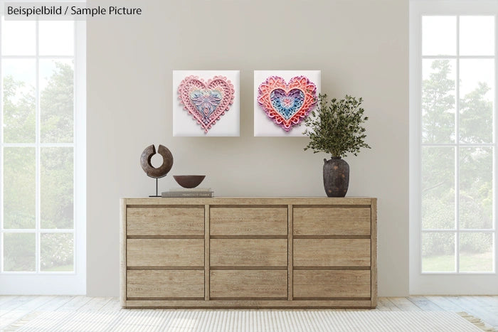 Modern living room with two heart-shaped art pieces above a wooden dresser, flanked by large windows and decorative items.