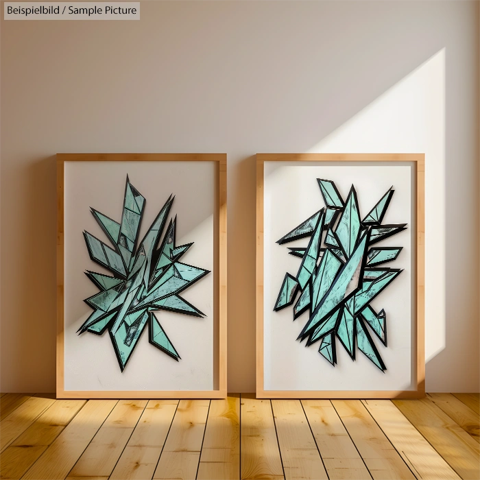 Framed abstract art with angular turquoise shapes on a wooden floor in a sunlit room.