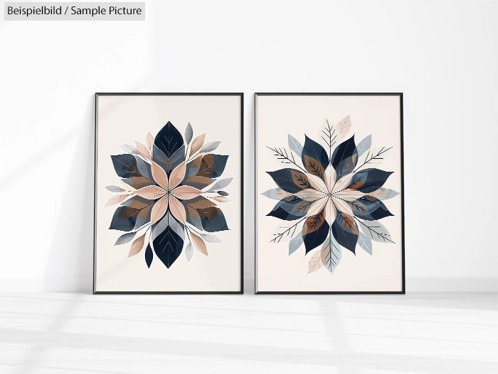 Two framed geometric leaf art prints with blue and beige tones on a white wall.