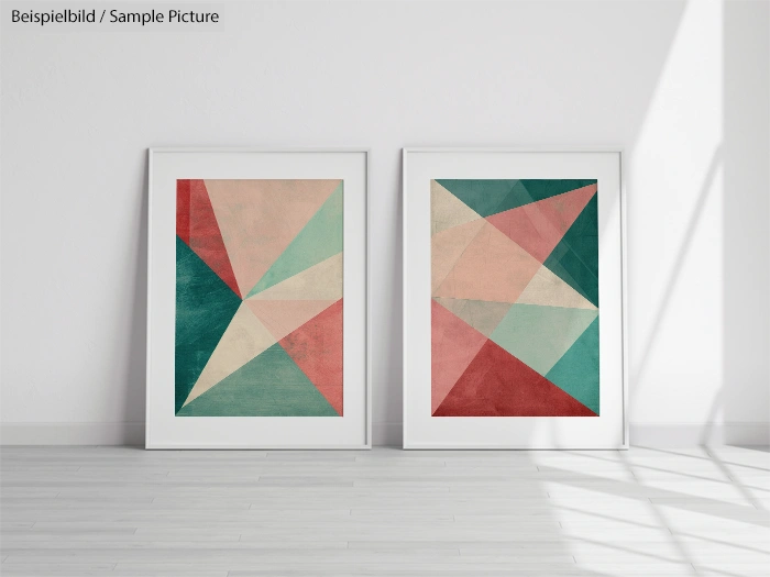 Two framed abstract art pieces with geometric shapes in red, green, and beige hues, displayed against a white wall.