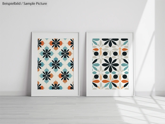 Two framed geometric floral artworks in a minimalistic room with sunlight.