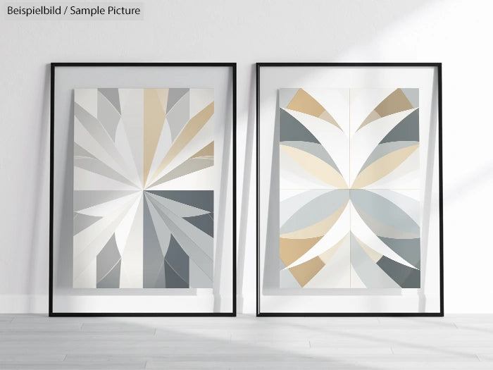 Geometric abstract art prints with shades of beige, gray, and white in black frames against a white wall.