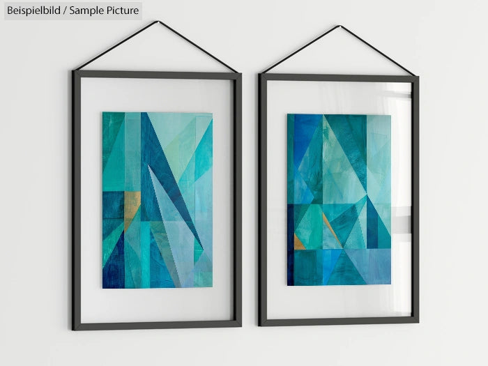 Two geometric abstract paintings in shades of blue and green, framed and hung side by side on a white wall.