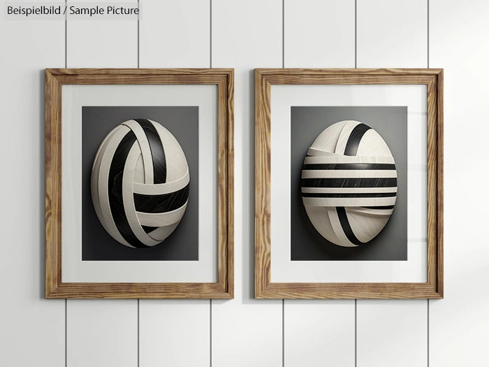 Two framed abstract art pieces with black and white geometric designs in wooden frames on a white paneled wall.