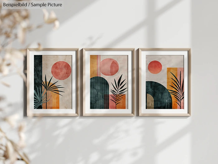 Set of three framed abstract botanical prints with geometric shapes in earthy tones.