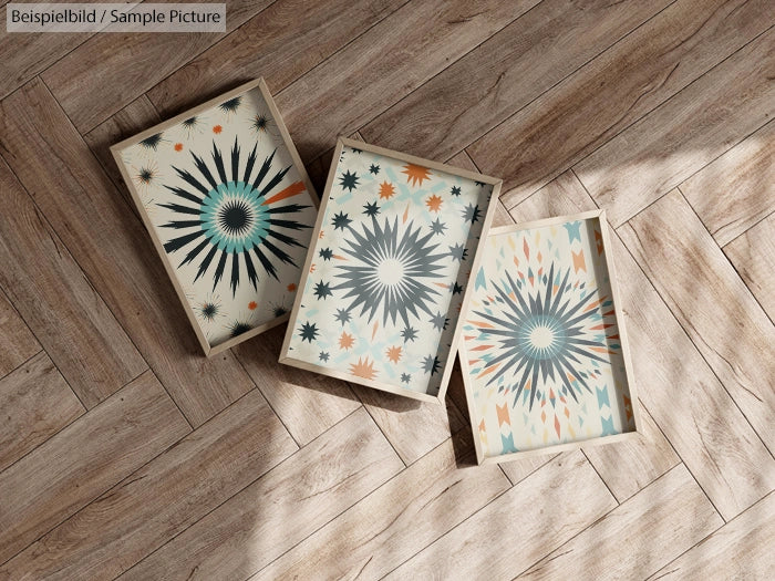 Decorative trays with geometric star patterns on wooden floor.