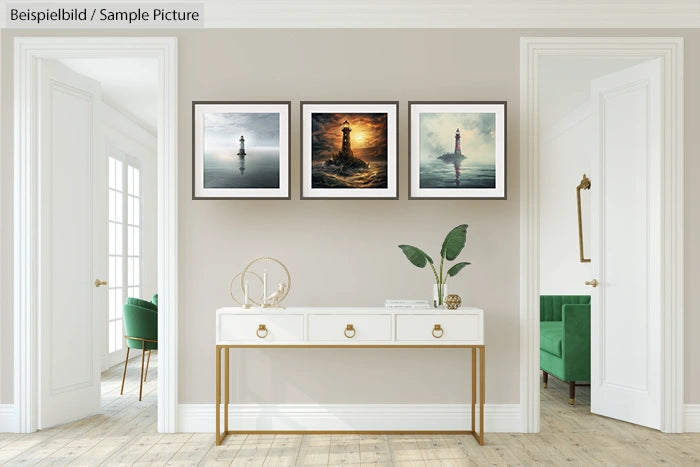 Modern room with green chairs, white console, minimalist decor, and three lighthouse paintings on a beige wall.