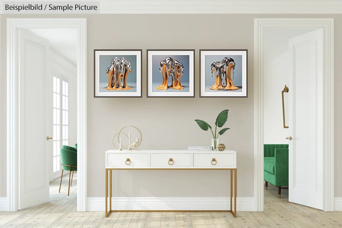 Modern interior with a white console table, green chairs, and three framed abstract paintings on the wall.