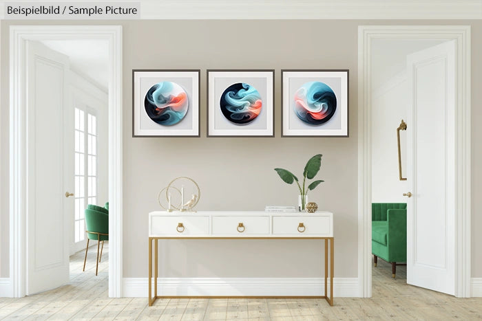 Elegant room with framed abstract art, white console table, and green chairs in a modern interior.