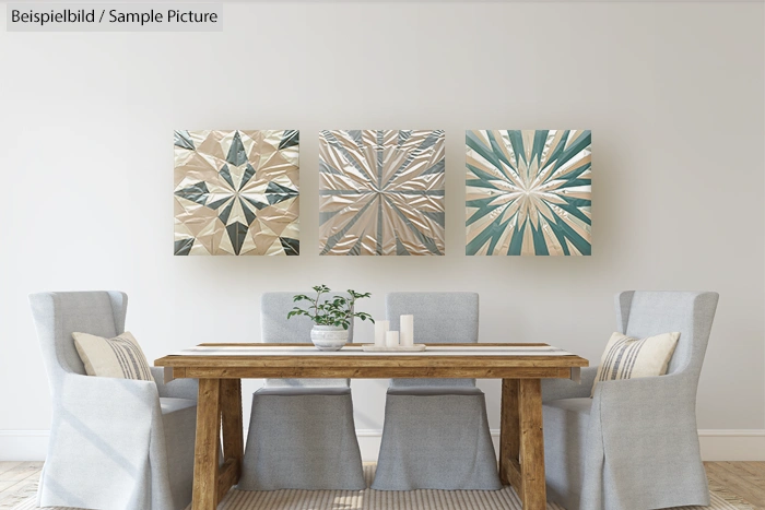 Modern dining room with wooden table, four gray chairs, and abstract paintings on a white wall.