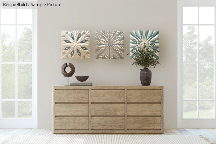 Modern living room with a wooden dresser, abstract wall art, and decorative vases by large windows.