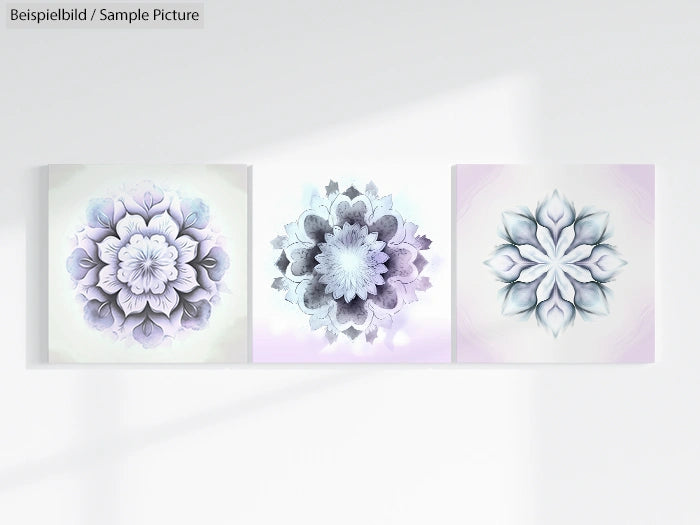 Three abstract floral mandala patterns in pastel shades of purple and white, displayed in a row against a light background.