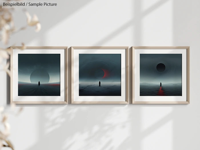 Trio of framed surreal landscape art on wall, each depicting a solitary figure under celestial phenomena.