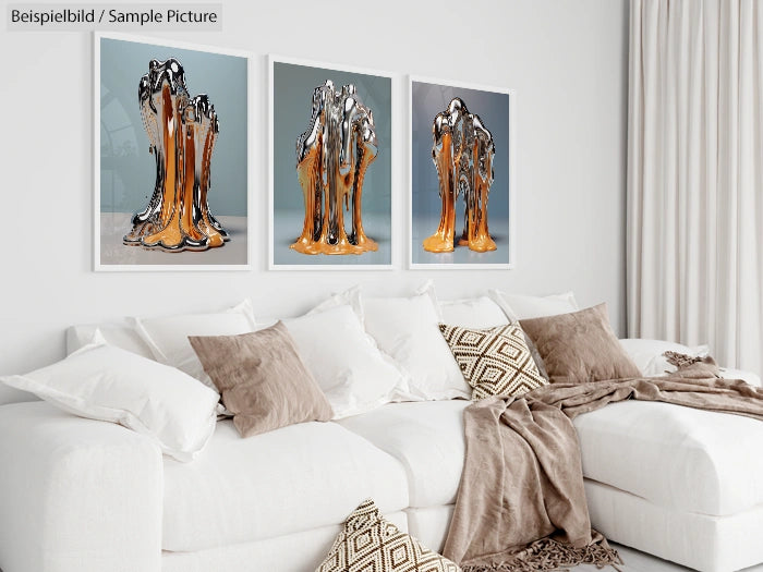 Modern living room with white sofa, decorative beige pillows, and three abstract metal art pieces on the wall.