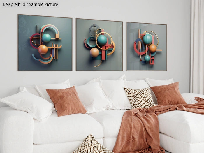 Minimalist living room with beige couch, brown cushions, and three abstract geometric artworks on the wall.