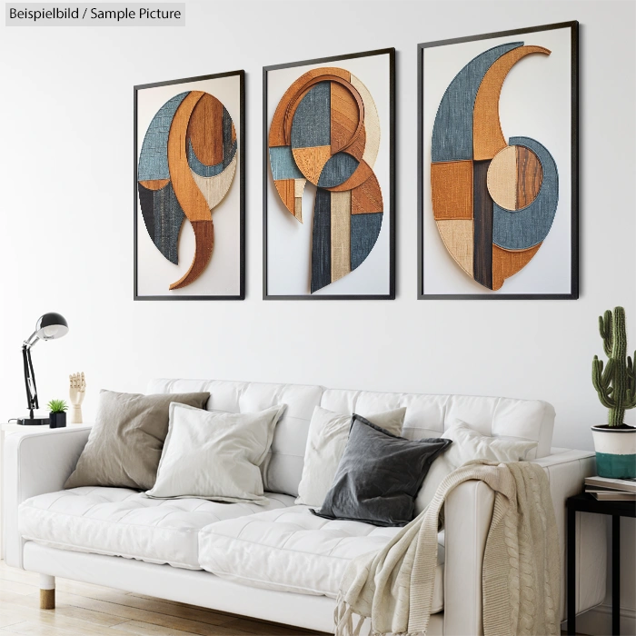 Modern living room with white sofa, neutral pillows, and abstract wood wall art above; small cactus and lamp beside sofa.