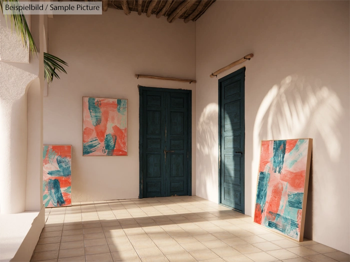 Art gallery interior with abstract paintings, teal doors, and natural light casting shadows on tiled floor.