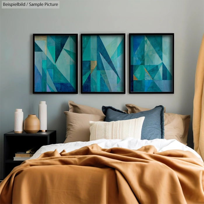 Cozy bedroom with brown bedding and three abstract blue-themed paintings above the headboard.