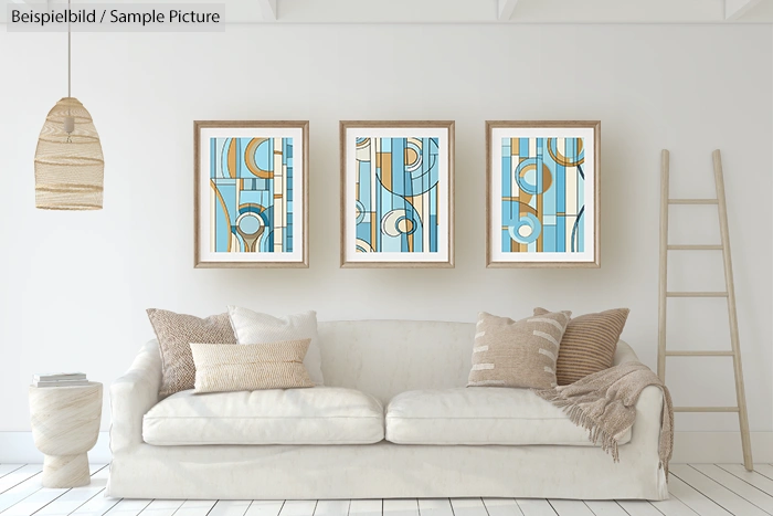 Modern living room with white sofa, abstract blue and gold framed artwork, and minimalist decor.