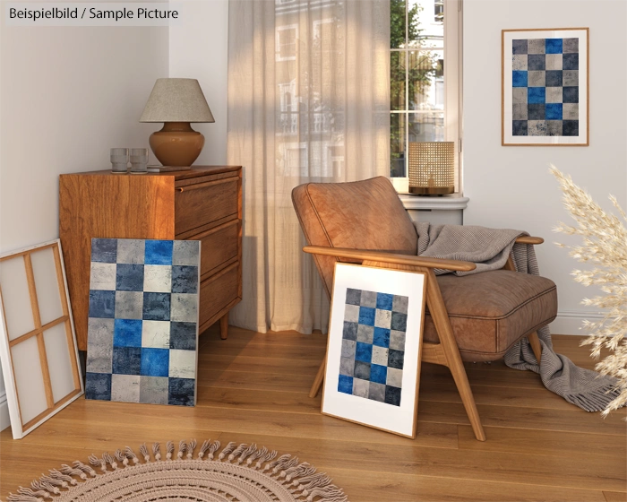 Cozy room with armchair, wooden dresser, and blue abstract wall art.