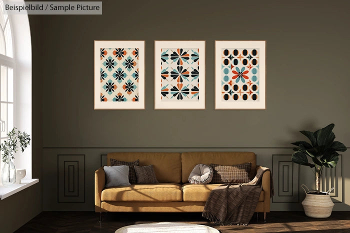 Living room with three abstract art paintings above a brown sofa and cushions, plant and window with sunlight.