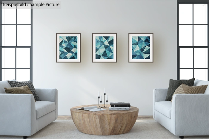 Modern living room with geometric artwork, white sofas, wooden coffee table, and large windows.