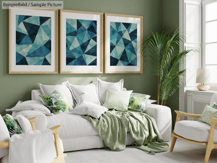 Stylish living room with abstract geometric artwork, white sofa, green cushions, and indoor plant against a green wall.