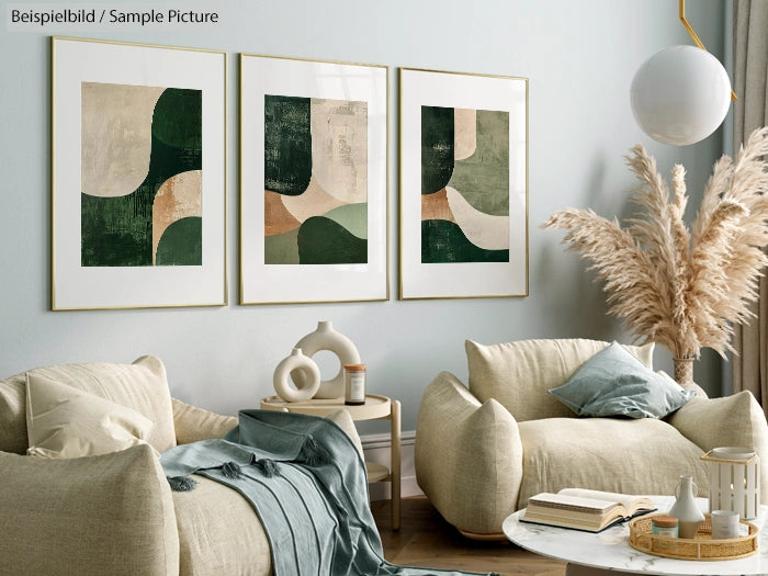 Modern living room with abstract art, beige armchairs, and pampas grass decor, showcasing a calm and stylish interior.