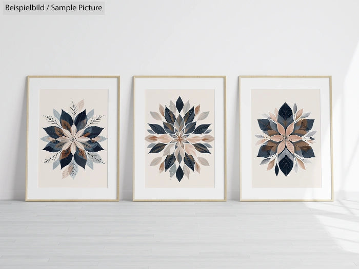 Set of three framed leaf art prints in beige, blue, and brown hues, displayed against a white wall.