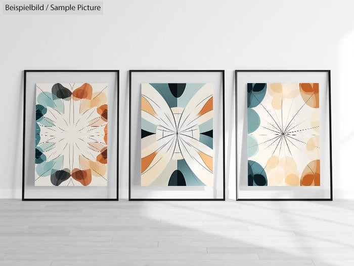 Three framed abstract artworks with geometric shapes and muted colors, displayed on a light floor against a white wall.