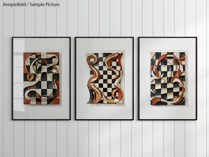 Three framed abstract paintings with checkered patterns and swirling lines on a white paneled wall.