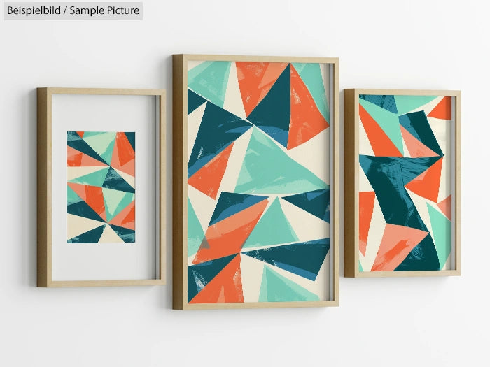 Three framed abstract paintings with geometric patterns in teal, orange, and cream tones on a white wall.