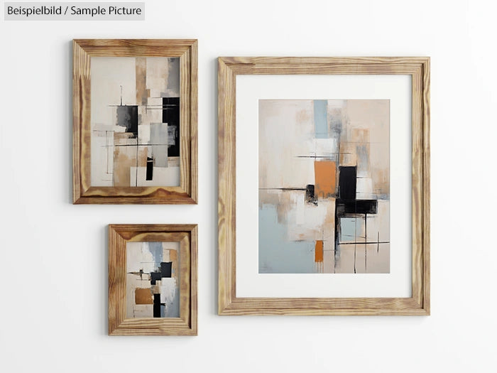 Three framed abstract paintings with geometric shapes in neutral tones on a white wall.