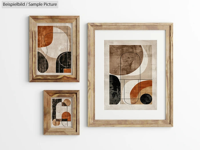 Three framed geometric abstract artworks with earthy tones on a white wall.